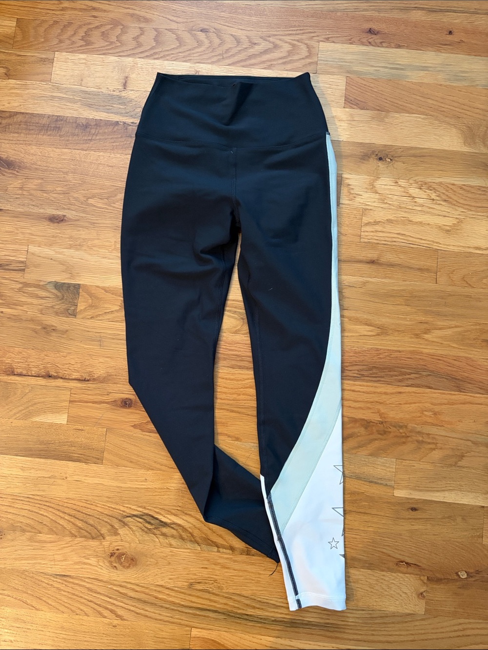 Peloton Black Leggings with White Side Panel size small